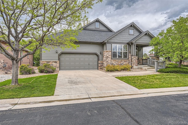 craftsman-style house with a porch, a garage, and a front lawn