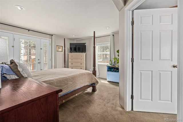 bedroom featuring french doors, carpet, and access to exterior