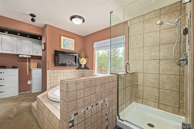 bathroom with radiator and separate shower and tub