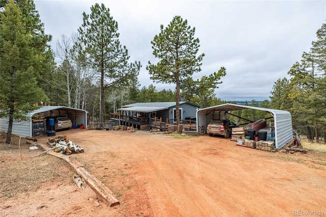 view of yard with a carport