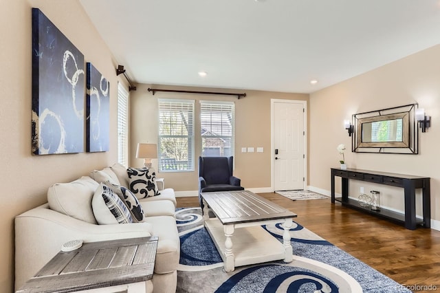 2165 Summerlin Ln, Longmont, CO 80503 - living area with wood finished floors, recessed lighting, and baseboards