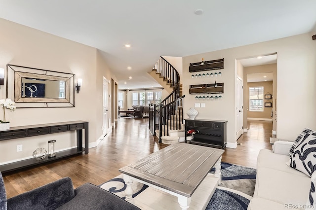 2165 Summerlin Ln, Longmont, CO 80503 - living room with stairway, wood finished floors, recessed lighting, and baseboards