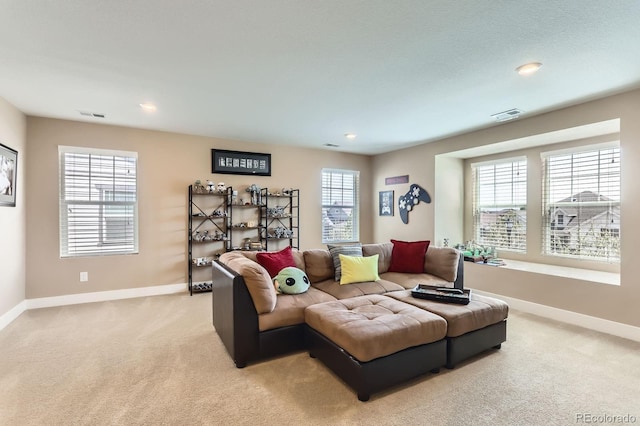 2165 Summerlin Ln, Longmont, CO 80503 - living area featuring light carpet, baseboards, and recessed lighting