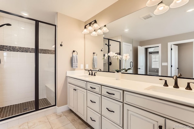 2165 Summerlin Ln, Longmont, CO 80503 - full bath with a shower stall, double vanity, and recessed lighting
