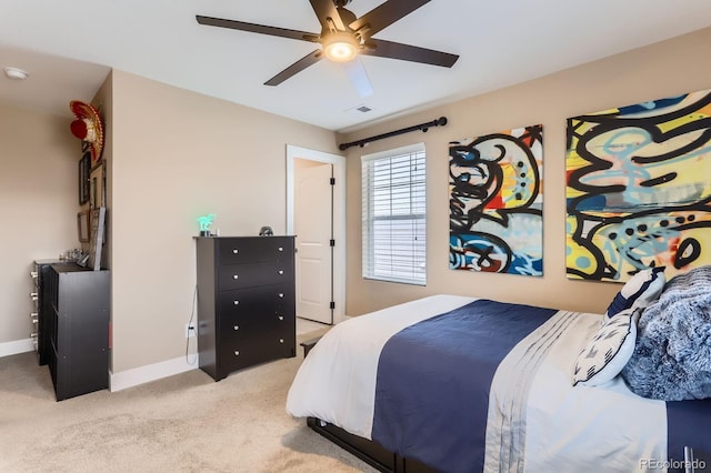 2165 Summerlin Ln, Longmont, CO 80503 - bedroom featuring light carpet, baseboards, and ceiling fan