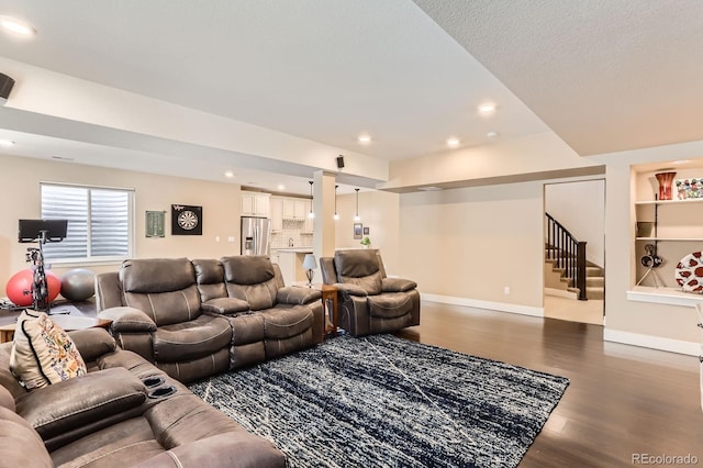2165 Summerlin Ln, Longmont, CO 80503 - living room with dark wood finished floors, stairway, recessed lighting, and baseboards