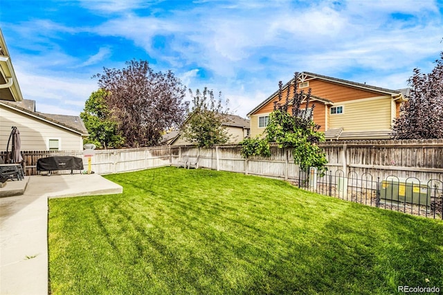 10076 Helena St, Commerce City, CO 80022 - fenced backyard featuring a patio area
