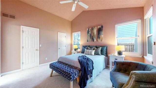 2266 S Kenton St, Aurora, CO 80014 - bedroom featuring light carpet, baseboards, visible vents, a ceiling fan, and lofted ceiling