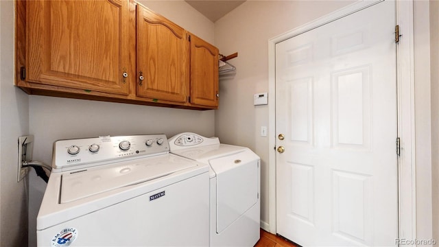 2266 S Kenton St, Aurora, CO 80014 - laundry room featuring cabinet space and washer and dryer
