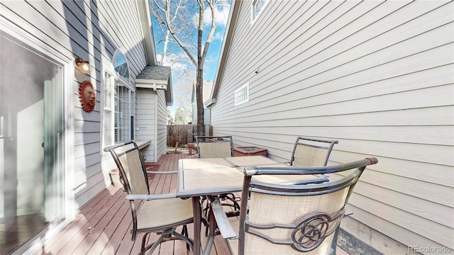 2266 S Kenton St, Aurora, CO 80014 - wooden terrace with outdoor dining area
