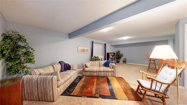 2266 S Kenton St, Aurora, CO 80014 - carpeted living room with a textured ceiling, beamed ceiling, and baseboards