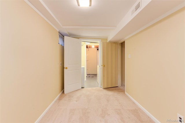 corridor with light colored carpet