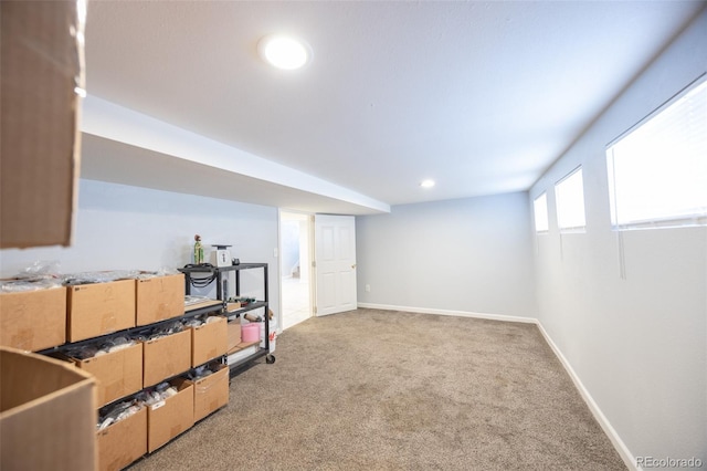 basement featuring recessed lighting, carpet flooring, and baseboards