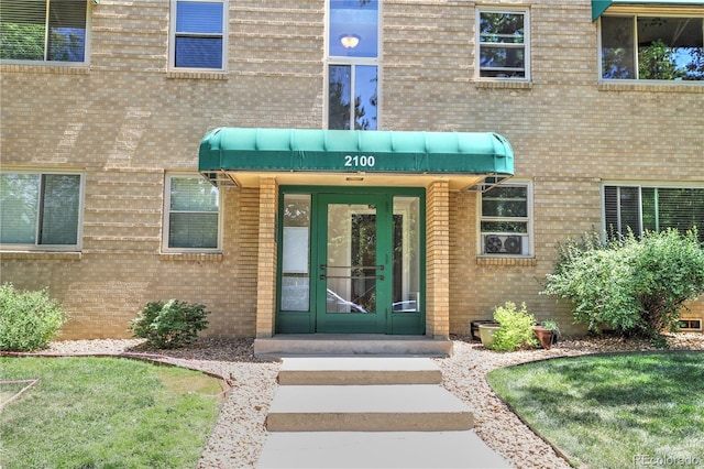 2100 N Franklin St Unit 8, Denver, CO 80205 - property entrance with brick siding and french doors