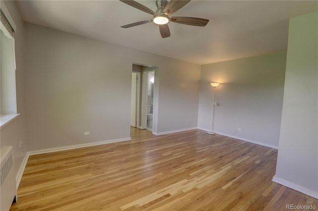 2100 N Franklin St Unit 8, Denver, CO 80205 - unfurnished room featuring ceiling fan, light wood-style floors, and baseboards