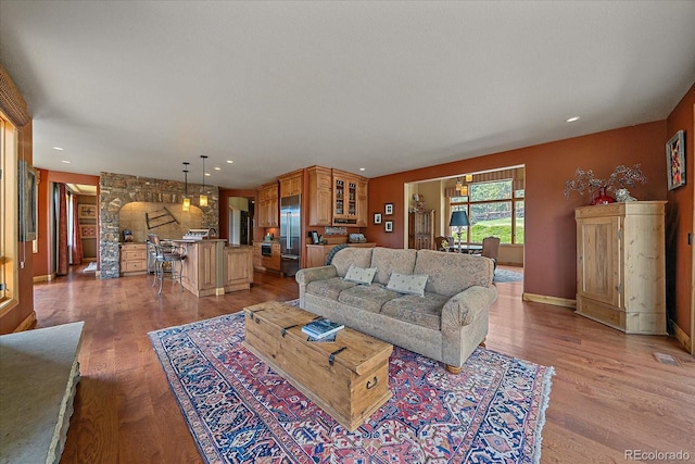1456 Shavano Ct, Evergreen, CO 80439 - living room featuring light wood-type flooring and recessed lighting