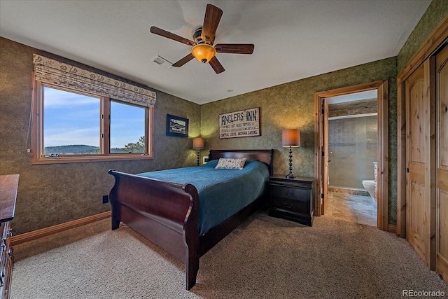 1456 Shavano Ct, Evergreen, CO 80439 - carpeted bedroom with a ceiling fan and baseboards