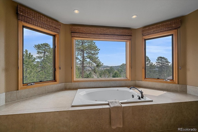 1456 Shavano Ct, Evergreen, CO 80439 - bathroom with a bath and recessed lighting