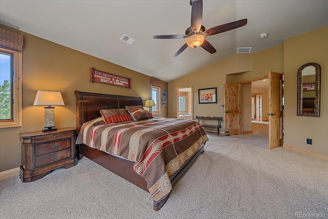 1456 Shavano Ct, Evergreen, CO 80439 - carpeted bedroom featuring multiple windows, lofted ceiling, and ceiling fan