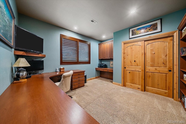 1456 Shavano Ct, Evergreen, CO 80439 - home office with recessed lighting, built in desk, and light carpet