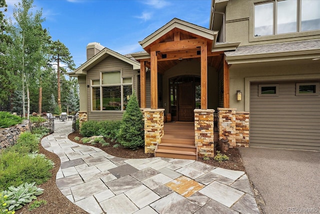 1456 Shavano Ct, Evergreen, CO 80439 - property entrance featuring stucco siding and stone siding