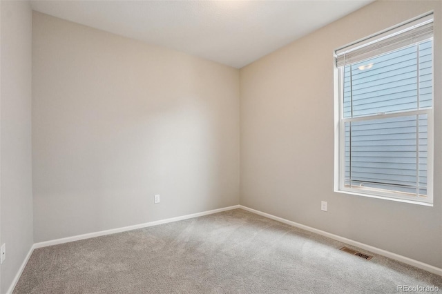 5928 N Odessa St, Aurora, CO 80019 - carpeted spare room featuring baseboards