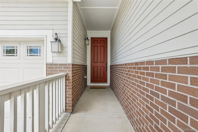 5928 N Odessa St, Aurora, CO 80019 - property entrance featuring brick siding and covered porch