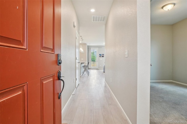 5928 N Odessa St, Aurora, CO 80019 - hall with baseboards and light wood-style flooring