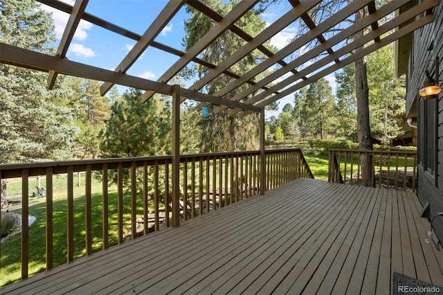 wooden deck with a lawn