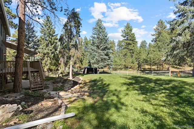 view of yard featuring a deck