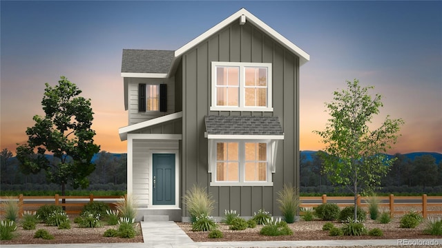 2094 Wagon Wheel Aly, Brighton, CO 80601 - view of front facade featuring board and batten siding and roof with shingles