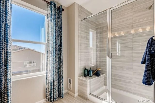 2094 Wagon Wheel Aly, Brighton, CO 80601 - full bath featuring a shower stall and baseboards