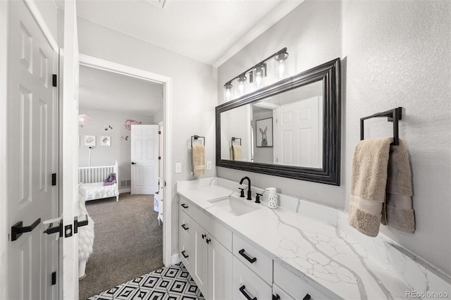 ensuite bathroom with vanity