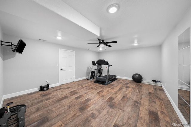workout room featuring a ceiling fan, wood finished floors, baseboards, and recessed lighting