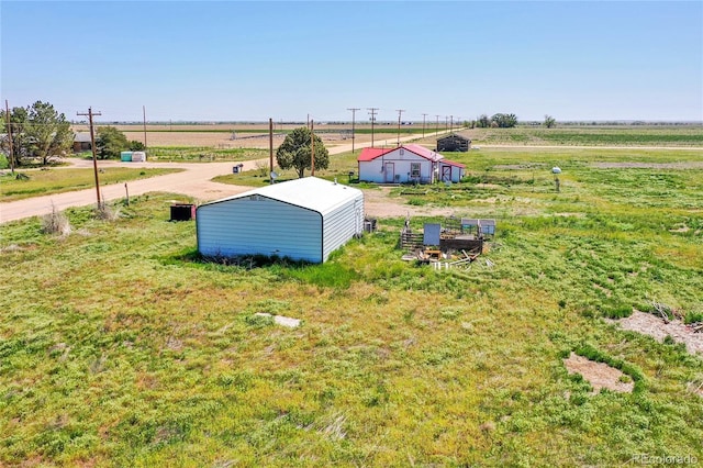 76000 E 168th Ave, Wiggins, CO 80654 - view of yard featuring a view of countryside and an outbuilding