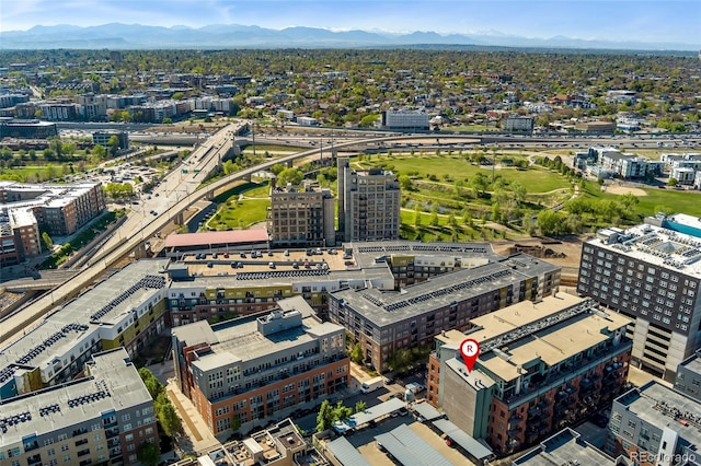 view of urban area featuring a mountain backdrop