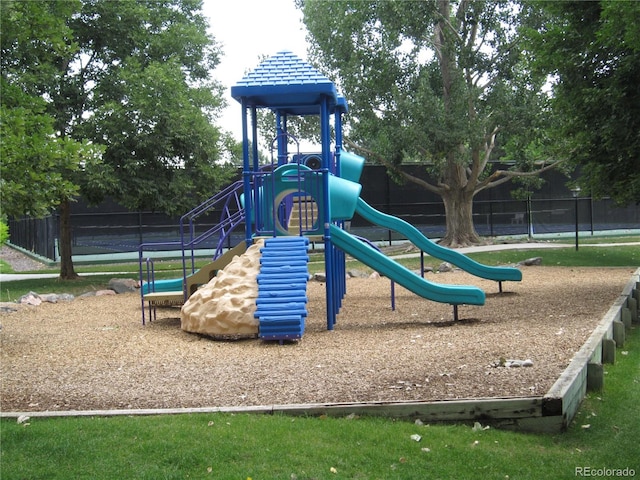 community jungle gym with fence