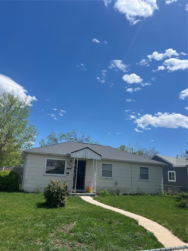 1132 Moline St, Aurora, CO 80010 - view of front facade featuring a front lawn