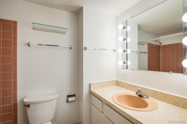 850 20th St Unit 203, Boulder, CO 80302 - full bath featuring toilet, vanity, and a tile shower