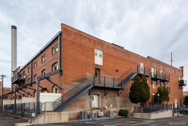 view of building exterior with central AC