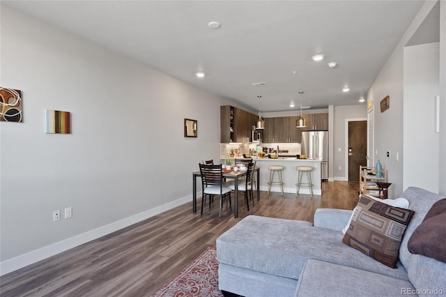 living room featuring dark hardwood / wood-style floors