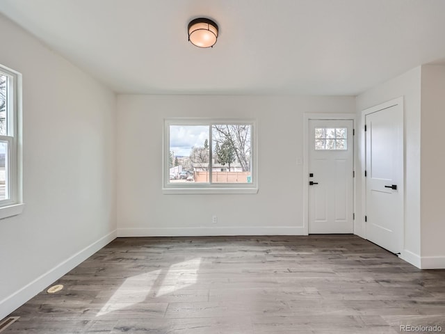 foyer entrance featuring light wood-type flooring