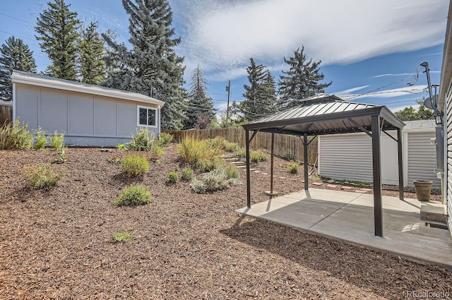 view of yard featuring a patio and a gazebo