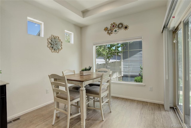 6717 Golden Briar Ln, Colorado Springs, CO 80927 - dining space featuring light wood finished floors, plenty of natural light, and baseboards