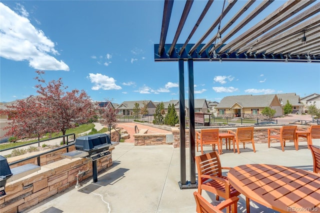 6717 Golden Briar Ln, Colorado Springs, CO 80927 - view of patio featuring a residential view, a pergola, and outdoor dining space