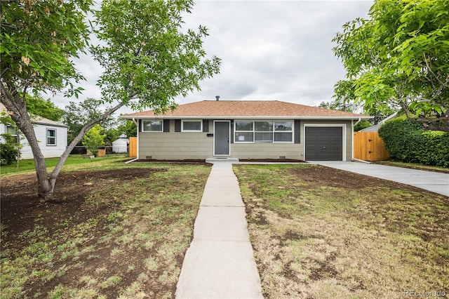 740 Moline St, Aurora, CO 80010 - ranch-style home with concrete driveway, an attached garage, and a shingled roof