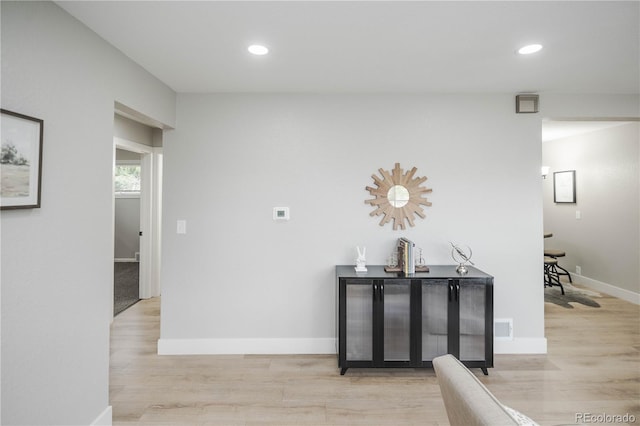 740 Moline St, Aurora, CO 80010 - hallway featuring light wood-type flooring, recessed lighting, and baseboards