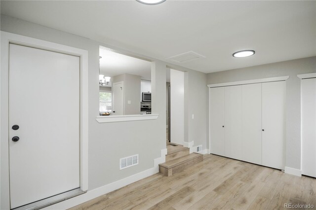 740 Moline St, Aurora, CO 80010 - entrance foyer with wood finished floors and baseboards