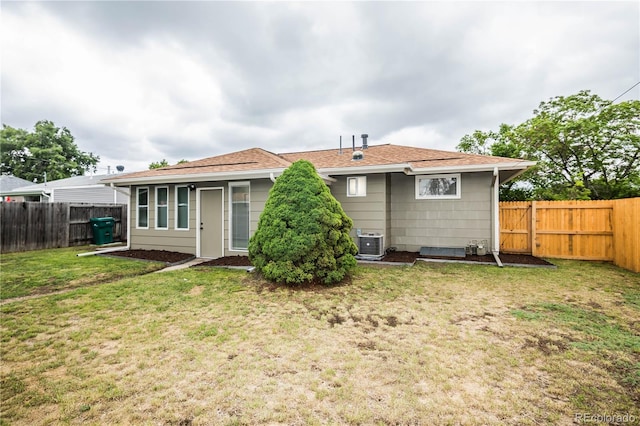 740 Moline St, Aurora, CO 80010 - back of property with cooling unit and roof with shingles