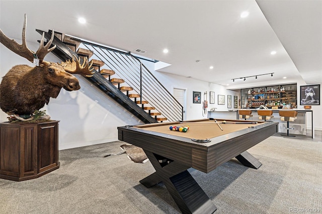 recreation room featuring light colored carpet, bar area, and billiards